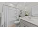 Bathroom featuring tub shower combo with white vanity and white toilet at 119 Yadkin St, Clayton, NC 27520