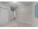 Bright bedroom features neutral carpet and closet with sliding doors at 119 Yadkin St, Clayton, NC 27520