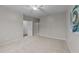 Empty bedroom featuring neutral walls, plush carpeting and a ceiling fan at 119 Yadkin St, Clayton, NC 27520
