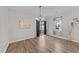 Open concept dining area with sliding door leading to the backyard and nice floors at 119 Yadkin St, Clayton, NC 27520