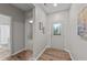 Inviting foyer with hardwood floors and decorative front door at 119 Yadkin St, Clayton, NC 27520