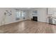Bright living room with wood flooring, a fireplace and a picturesque window at 119 Yadkin St, Clayton, NC 27520