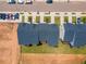 Aerial view of townhomes with backyard decks, showcasing the layout and green spaces of the community at 1359 Chowan Ave, Durham, NC 27713