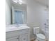 Clean bathroom with vanity, toilet and shower/tub combo ready for the next resident at 1359 Chowan Ave, Durham, NC 27713