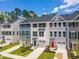 New townhomes with attractive curb appeal, modern design, and well-manicured lawns at 1359 Chowan Ave, Durham, NC 27713