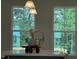 Bright kitchen window view featuring natural light, a sink, and a lush green view at 1359 Chowan Ave, Durham, NC 27713