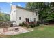 Spacious backyard with a deck, fire pit, and plenty of room for activities at 136 Garden Retreat Dr, Garner, NC 27529