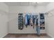 A walk-in closet with ample hanging space and organizational shelves at 136 Garden Retreat Dr, Garner, NC 27529