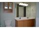Bathroom with double sink vanity and a large mirror at 136 Wedgewood Ct, Sanford, NC 27332