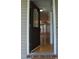 Welcoming foyer with hardwood floors and a decorative front door, leading to a bright living space at 136 Wedgewood Ct, Sanford, NC 27332