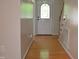 Inviting foyer with hardwood floors and white walls at 136 Wedgewood Ct, Sanford, NC 27332