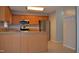 Spacious kitchen with stainless steel appliances, wood cabinets, and granite countertops at 136 Wedgewood Ct, Sanford, NC 27332