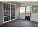 Enclosed sunroom with sliding glass doors and access to the outdoors at 136 Wedgewood Ct, Sanford, NC 27332