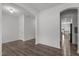 Open-concept living space showcases hardwood floors connecting the various living areas at 1414 Arena Ln, Fuquay Varina, NC 27526