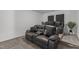 Cozy theater room with tiered seating and plush reclining chairs for an immersive movie experience at 1414 Arena Ln, Fuquay Varina, NC 27526