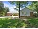 Backyard featuring a large yard, a patio, and mature trees at 1732 Edgewood Ave, Burlington, NC 27215