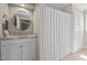 Bathroom featuring a single sink vanity and a shower with a curtain at 1732 Edgewood Ave, Burlington, NC 27215