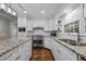 Gourmet kitchen with granite countertops, stainless steel appliances, and ample cabinet space at 1732 Edgewood Ave, Burlington, NC 27215