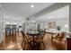 Open living room, dining room, and kitchen with hardwood floors and neutral paint at 1732 Edgewood Ave, Burlington, NC 27215