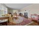 Cozy living room featuring a fireplace, hardwood floors, and ample space for relaxation at 1732 Edgewood Ave, Burlington, NC 27215