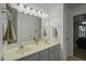 Well-lit bathroom with a double sink vanity and neutral tones at 178 Palmer Dr, Clayton, NC 27527