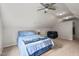 Bedroom with white walls and carpeted floors with blue bedding and a ceiling fan at 178 Palmer Dr, Clayton, NC 27527