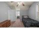 Bedroom with gray walls, carpeted floors, with a single bed near a window at 178 Palmer Dr, Clayton, NC 27527