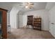 Bedroom with white walls and carpeted floors that features two cabinets and a display case at 178 Palmer Dr, Clayton, NC 27527