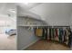 Angled closet with carpeting and an organized rack for hanging clothing at 178 Palmer Dr, Clayton, NC 27527