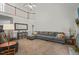 Bright living room with high ceilings, plush seating, and a view of the upper level at 178 Palmer Dr, Clayton, NC 27527