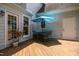Back deck features an outdoor dining set, a potted plant, and ample space for outdoor entertaining at 200 Frenchmans Bluff Dr, Cary, NC 27513