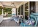 Cozy front porch featuring comfortable seating and ceiling fan, great for relaxing outdoors at 200 Frenchmans Bluff Dr, Cary, NC 27513