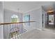 Hallway featuring a decorative chandelier, a window and view of the front door at 200 Frenchmans Bluff Dr, Cary, NC 27513