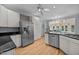 Bright kitchen features stainless steel appliances, sleek countertops, and ample cabinet space at 200 Frenchmans Bluff Dr, Cary, NC 27513