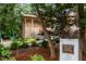 Bronze statue of Fred G. Bond standing in a wooded area, near a community building at 200 Frenchmans Bluff Dr, Cary, NC 27513