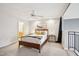 Bedroom with a view into an ensuite bathroom and a loft area at 200 S Dawson St # 114, Raleigh, NC 27601