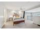Spacious bedroom features ceiling fan, ensuite, and decor at 200 S Dawson St # 114, Raleigh, NC 27601
