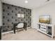 Bonus room features office space, a TV, and accent wall at 200 S Dawson St # 114, Raleigh, NC 27601