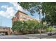 The building's exterior from across the street on a sunny day at 200 S Dawson St # 114, Raleigh, NC 27601