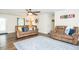 Inviting living room with hardwood floors, comfortable seating, and a stylish area rug at 2120 Northcrest Dr, Elon, NC 27244