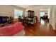 Dining area with hardwood floors featuring view into the living room at 2228 Cedar Grove Dr, Durham, NC 27703