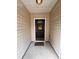 Inviting front entrance featuring a decorative wreath and a welcoming covered porch at 2228 Cedar Grove Dr, Durham, NC 27703