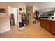 Open-concept kitchen transitioning into the living room with modern appliances and natural light at 2228 Cedar Grove Dr, Durham, NC 27703