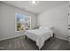 Bright bedroom offers a tranquil space to unwind and relax with ample sunlight and ceiling fan at 2321 Blue Crab Ct, Wake Forest, NC 27587