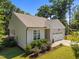 Well-maintained home featuring verdant lawn, mature shrubbery, and an attached two car garage at 2321 Blue Crab Ct, Wake Forest, NC 27587