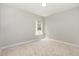 Neutral bedroom with carpet and one window at 2409 Valley Haven Dr, Raleigh, NC 27603