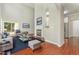 Bright living room with vaulted ceiling, fireplace, wood floors and plenty of natural light at 2409 Valley Haven Dr, Raleigh, NC 27603