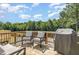 Outdoor deck with a grill and cozy seating, perfect for entertaining at 248 Amber Acorn Ave, Raleigh, NC 27603