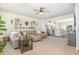 Inviting living room flows into a modern kitchen, featuring stylish decor and comfortable seating at 248 Amber Acorn Ave, Raleigh, NC 27603