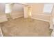 Cozy carpeted room with neutral walls and built-in storage and an adjoining room with a closet at 2708 Coleberry Trl, Rocky Mount, NC 27804